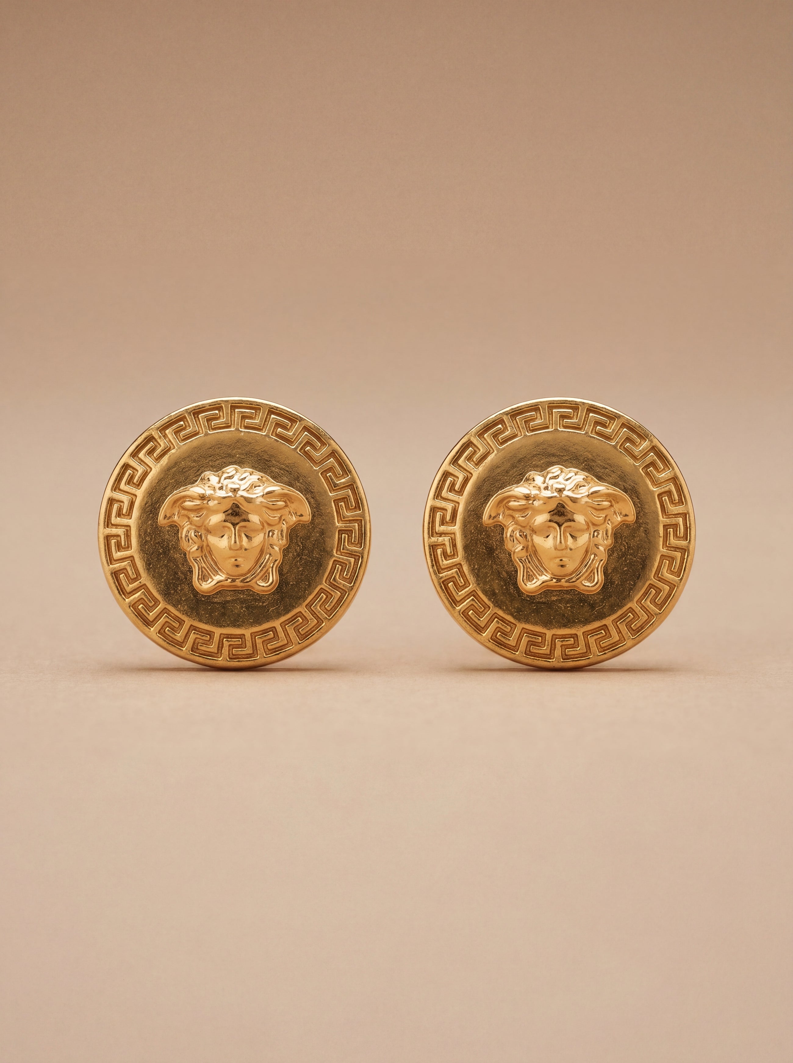 Versace Medusa Logo Earrings in Gold Metal